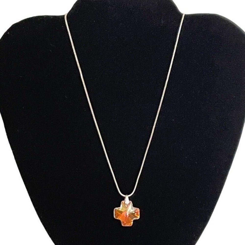 Crystal Cross with Colorful Aurora Borealis Traits